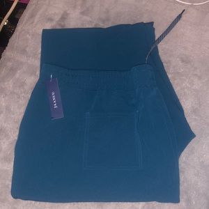 Jaanuu 2xl Caribbean blue scrub pants. Never worn before, no problems.